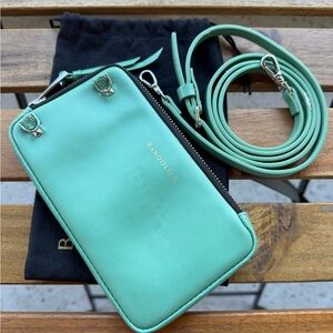 Bandolier pouch with strap